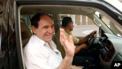 FILE - In this May 6, 2005 photo, former Ecuadorean President Abdala Bucaram leaves the Foreign Ministry in Panama City, Panama, where he was granted political asylum, despite an arrest warrant in his home country.