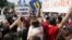 Supporters of gay marriage embrace outside the Supreme Court in Washington on June 26, 2013.