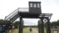 FILE - The wooden main gate leading into the former Nazi German Stutthof concentration camp is seen in Sztutowo, Poland, July 18, 2017.
