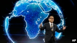 Toyota CEO Akio Toyoda talks about building the prototype Toyota city of the future, called the Woven City before the CES tech show Monday, Jan. 6, 2020, in Las Vegas. (AP Photo/Ross D. Franklin)