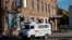 An ambulance moves past a hospital building in the town of Shelekhov in the Irkutsk region on October 7, 2026.