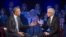 President Barack Obama, left, speaks during a CNN televised town-hall meeting hosted by Anderson Cooper, right, at George Mason University in Fairfax, Va., Jan. 7, 2016.