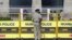 Indian policemen stand guard outside the Taj Mahal hotel in Mumbai, where terorrists launched coordinated terror attacks on November 26, 2008.