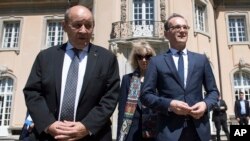 Menteri Luar Negeri Perancis Jean-Yves Le Drian (kiri) bersama Menteri Luar Negeri Jerman Heiko Maas di Villa Borsig, Berlin, Jerman, 7 Mei 2018. (Foto: dok).