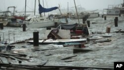 Barcos destruídos pelo furacão, 25 de julho, em Corpus Christi, Texas. (AP Photo/Eric Gay)