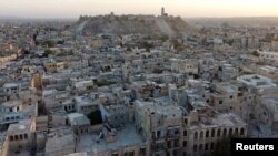 FILE - A general view taken with a drone shows Aleppo's historic citadel, controlled by forces loyal to Syria's President Bashar al-Assad, as seen from a rebel-held area of Aleppo, Syria.