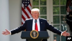 도널드 트럼프 미국 대통령이 2017년 6월 1일 백악관 로즈가든에서 미국의 파리기후변화협정 탈퇴를 발표하고 있다