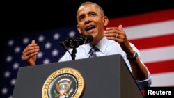 U.S. President Barack Obama speaks about the economy during a visit to Austin, Texas, July 10, 2014. 