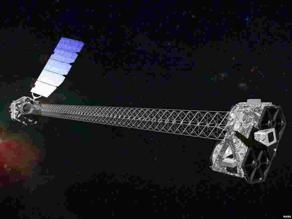 Artist&#39;s concept of NuSTAR on orbit that shows its 10- meter mast that separates the optics modules (right) from the detectors in the focal plane (left). (NASA)