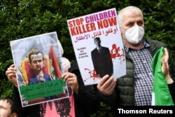 تظاهرات مخالفان اسد در برلین علیه انتخاب مجدد او