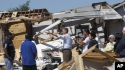 Le président Obama et la première dame, Michèlle Obama, à Tuscaloosa