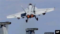 A U.S. Navy F/A-18 Super Hornet takes off from the flight deck of the USS George Washington during 'Keen Sword' U.S.-Japan joint military exercise over the Pacific Ocean (File Photo)