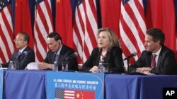 From left, Chinese State Councilor Dai Bingguo, China's Vice Premier Wang Qishan, Secretary of State Hillary Rodham Clinton, and Treasury Secretary Timothy Geithner take part in a joint meeting of the US-China Strategic and Economic Dialogue, May 10, 201