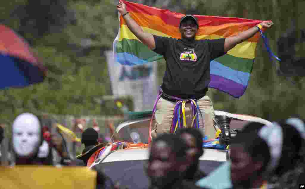 Ugandans take part in the 3rd Annual Lesbian, Gay, Bisexual and Transgender (LGBT) Pride celebrations in Entebbe, Aug. 9, 2014.