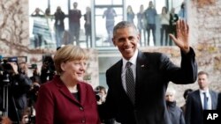 Presiden Obama (kiri) bersama Kanselir Jerman, Angela Merkel di Berlin, Jerman, 18 November 2016 (AP Photo/Markus Schreiber).