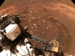 FILE - This photo made available by NASA was taken during the first drive of the Perseverance rover on Mars, March 4, 2021. Perseverance landed on Feb. 18, 2021.