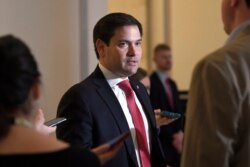 FILE - Sen. Marco Rubio, R-Fla., talks to reporters on Capitol Hill in Washington, March 20, 2020.