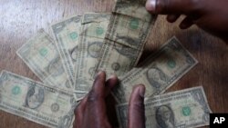 Zimbabwe uses the United States dollar and other currencies.