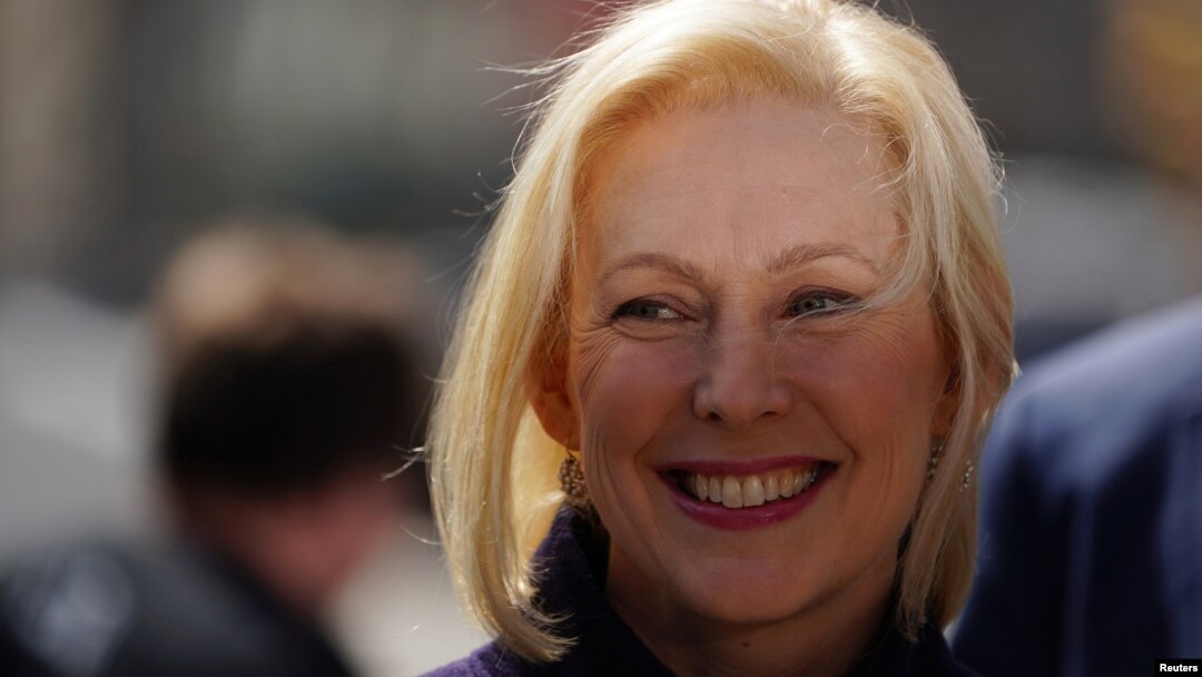 FILE - Democratic 2020 U.S. presidential candidate and U.S. Senator Kirsten Gillibrand (D-NY) stands and waits to take the stage during her campaign kick off event in New York, New York, March 24, 2019. 