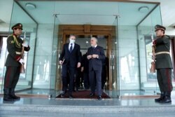 Abdullah Abdullah, Chairman of the High Council for National Reconciliation, center right, walks with U.S. Secretary of State Antony Blinken, at the Sapidar Palace in Kabul, Afghanistan, April 15, 2021.