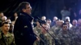 Defense Secretary Ashton Carter speaks with U.S. military personnel at Kandahar Airfield in Afghanistan, Feb. 22, 2015.