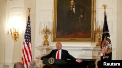 Under a painting of President Abraham Lincoln, U.S. President Donald Trump speaks during a National Governors Association meeting at the White House in Washington, Feb. 27, 2017.