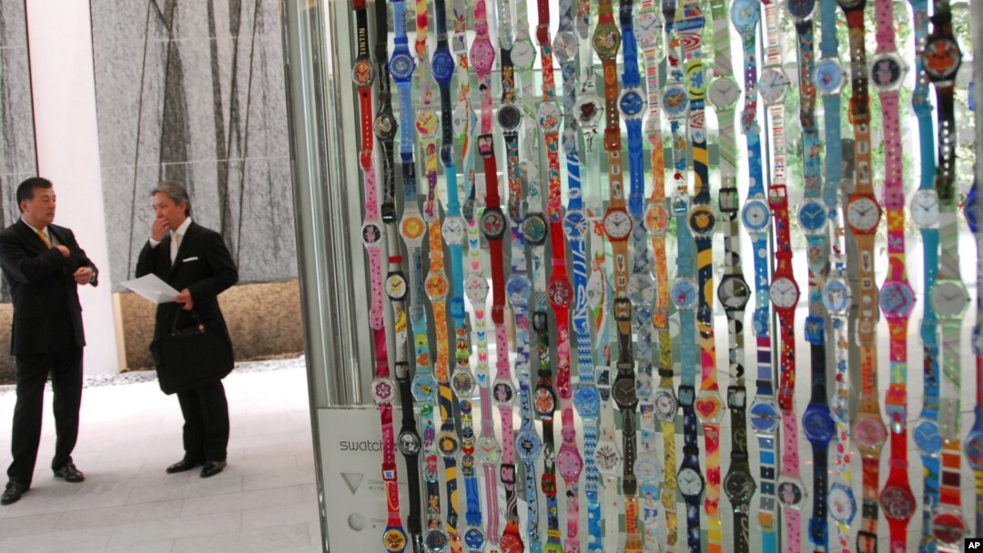 FILE - Swatch watches are displayed in the company's flagship store in Japan, in Tokyo's Ginza shopping district.