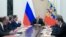 FILE - Russian President Vladimir Putin chairs a Security Council meeting in the Kremlin in Moscow, Russia, Jan. 13, 2017. Experts say Putin has made it his foreign policy goal to weaken America’s traditional links to its allies and to divide NATO.