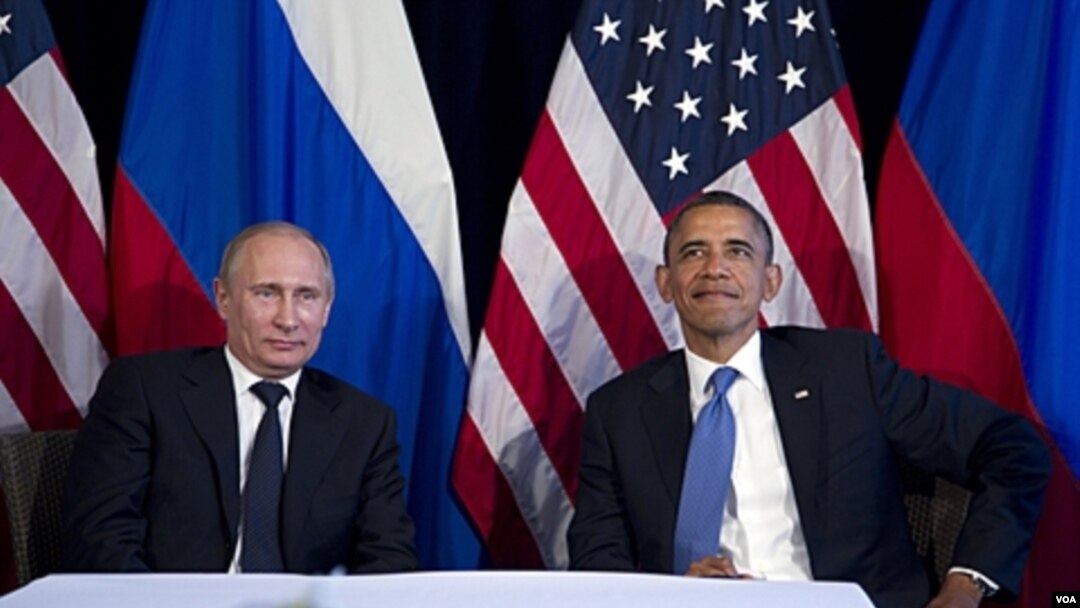 Presidents Obama (r) and Putin at the G20 meeting in Los Cabos.