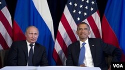 Presidents Obama (r) and Putin at the G20 meeting in Los Cabos.