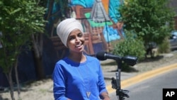 Democrat Rep. Ilhan Omar addresses media after lunch at the Mercado Central in Minneapolis, Aug. 11, 2020, primary Election Day in Minnesota. 