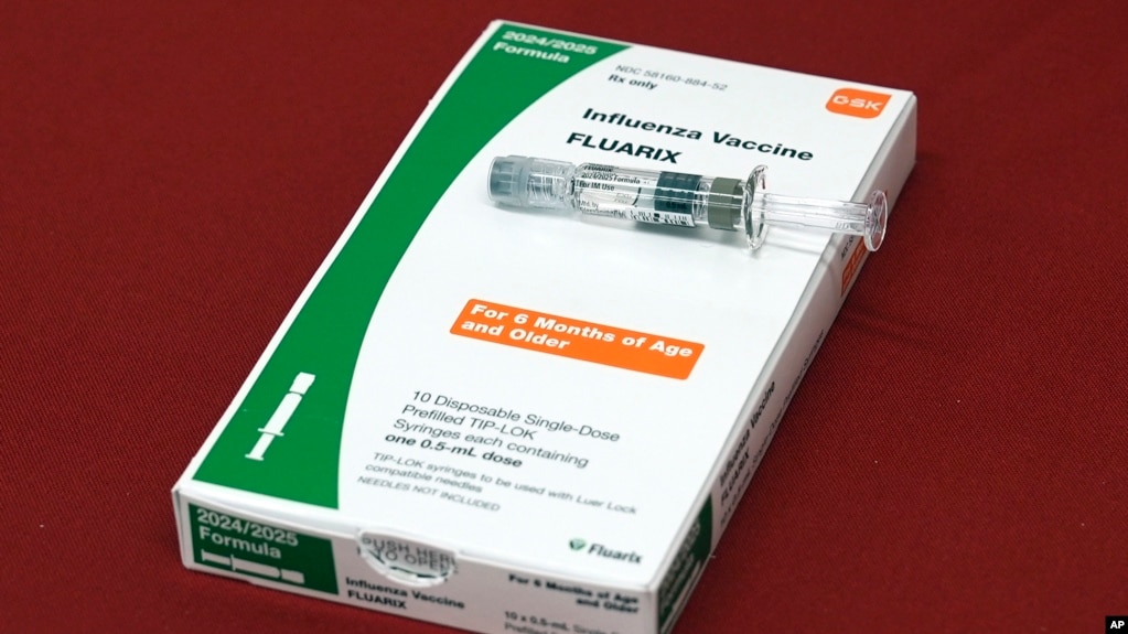 FILE - A flu vaccine is displayed at a pharmacy in New York, on Tuesday, Sept. 24, 2024. (AP Photo/Mary Conlon, File)