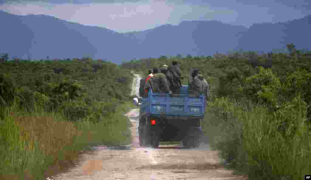 A truckload of rebel supporters of Laurent Nkunda drove through the park on a November day in 2008. Nkunda is a former Democratic Republic of Congo general whose miltias support Tutsi interests in the region.