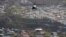 Marine One helicopter carrying President Donald Trump surveys areas impacted by Hurricane Maria, Oct. 3, 2017, near San Juan, Puerto Rico.