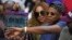 FILE - Beyonce and Jay Z watch during the first half of an NBA basketball first-round playoff series between the Los Angeles Clippers and the Utah Jazz in Los Angeles, -April 30, 2017. 