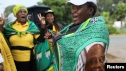 Supporters of South African President Cyril Ramaphosa sing and dance ahead of his arrival at the African National Congress (ANC) National Executive Committee meeting in Johannesburg, South Africa, Dec. 5, 2022.