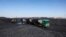FILE: A truck loaded with coal drives off at Canyon Coal's Khanye colliery near Bronkhorstspruit, around 90 kilometers north-east of Johannesburg, South Africa. Taken April 26, 2022.