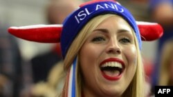 A fan of Iceland's handball team wearing a hat reacts ahead of the men's preliminary Group A handball match Iceland vs France for the London 2012 Olympics Games on August 4, 2012 at the Copper Box hall in London. 