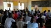 Students attend a class at the Sweswe Primary School after schools reopened following the COVID-19 shutdown in Kyaka II Refugee Settlement, in Kyegegwa District, Uganda, Jan. 11, 2022. 