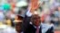 Kenya's President Uhuru Kenyatta arrives to attend Mashujaa (Heroes) Day at the Nyayo National Stadium in capital Nairobi, Oct. 20, 2013. 