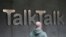 A man walks past a company logo outside a TalkTalk building in London, Oct. 23, 2015.