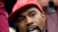 FILE - Rapper Kanye West speaks during a meeting with U.S. President Donald Trump to discuss criminal justice reform in the Oval Office of the White House in Washington, Oct., 11, 2018.
