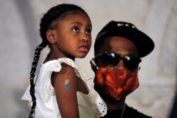 Gianna Floyd, the daughter of George Floyd, listens to a a news conference with Stephen Jackson, June 2, 2020, in Minneapolis, Minn.