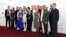 FILE - Cast members pose upon arrival at the premiere for 'The Crown' season 6 finale, in London on Dec. 5, 2023. Even when hit TV series such as "The Crown" or "Bridgerton" have wide appeal, Netflix still tries to cater to the divergent tastes in its vast audience.