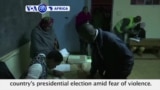 VOA60 Africa - Kenyans Vote in Hotly Contested Elections