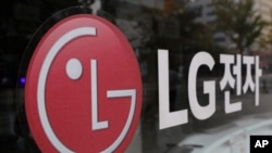 FILE - This Oct. 26, 2017, photo shows the corporate logo of LG Electronics in Goyang, South Korea. Two South Korean vehicle battery makers have settled a trade dispute that will allow one of them to produce batteries in the U.S. state of Georgia.