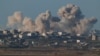 Smoke rises inside the Gaza Strip, as seen from southern Israel