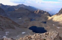 This undated photo provided by the Inyo County Sheriff's Department shows 6th lake below Mount Williamson where authorities say the skeletal remains of a person were discovered on Oct. 7, 2019 beneath the state's second-highest peak.