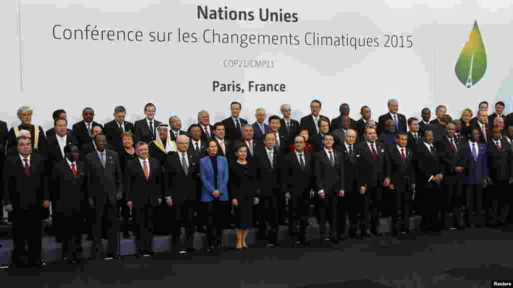 World leaders pose for a family photo during the opening day of the World Climate Change Conference 2015 (COP21) at Le Bourget, near Paris, France, November 30, 2015.