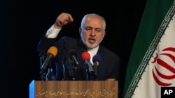 FILE — Iranian Foreign Minister Mohammad Javad Zarif speaks during a conference in Tehran, Feb. 23, 2021. Zarif has resigned as the nation's vice president. 